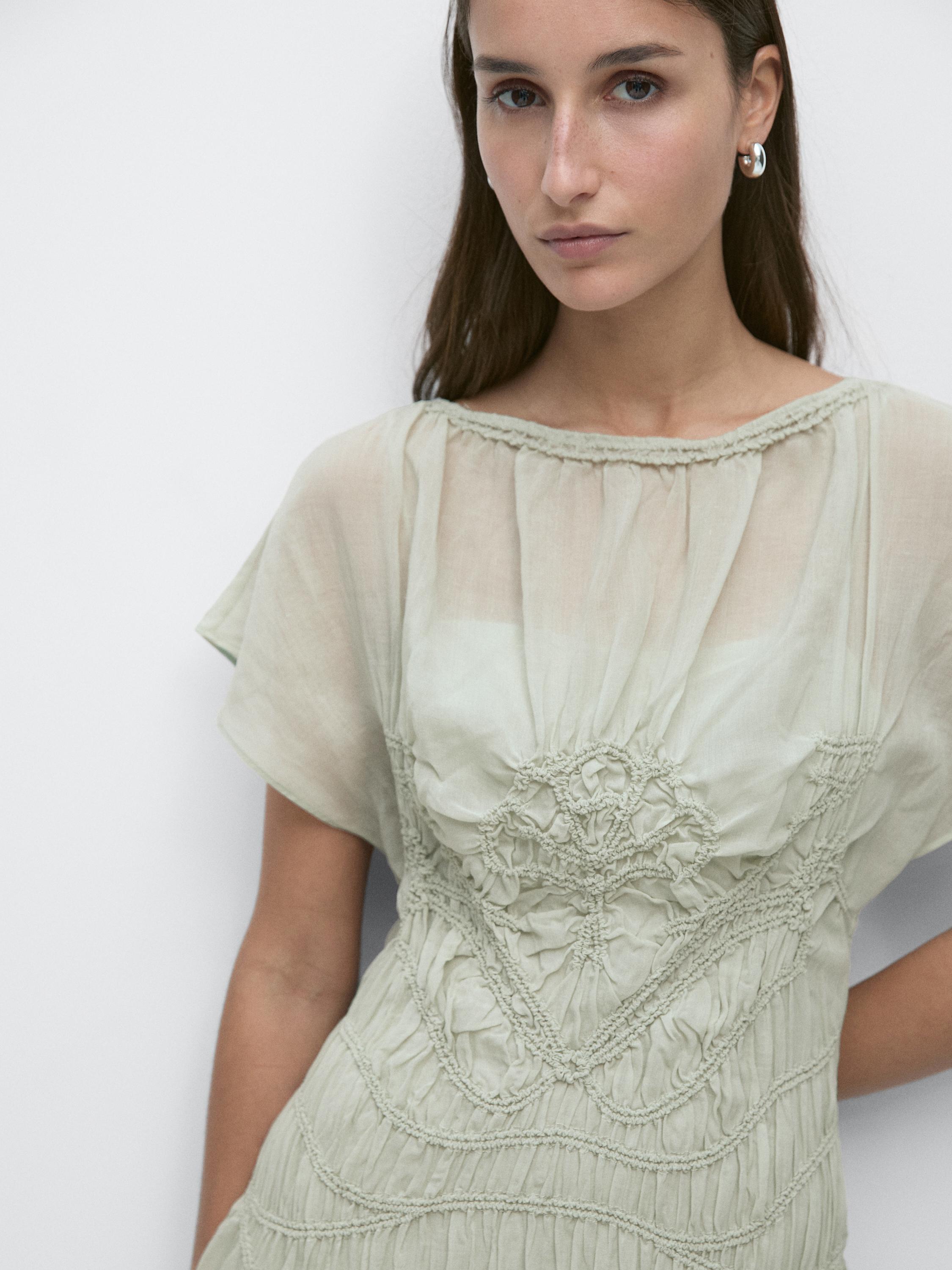 Long flowing dress with embroidered details
